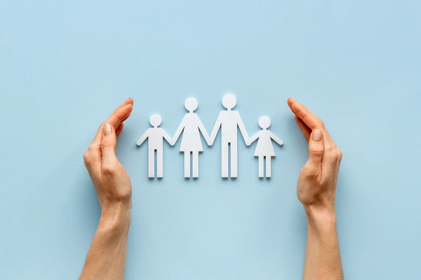 hands-holding-family-figure-top-600nw-1938514687